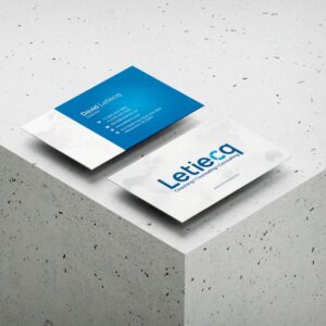 4 A sleek business card with a modern design, featuring company logo, contact information, and professional color scheme.